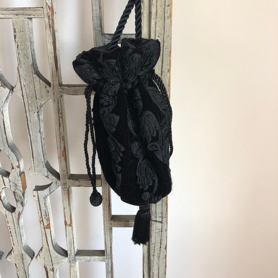 black drawstring evening bag