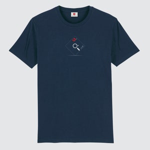 May include: A navy blue t-shirt with a white graphic of a floppy disk with the number "12" in red on it.