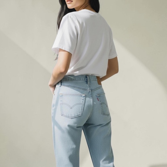 Vintage 1995 Levi's 501 Jeans: Size 28 in Faded Light Wash Blue