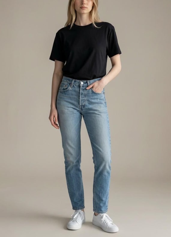 Size 25 Vintage Levi's 501 Button Fly Jeans in Faded Medium Blue with Whiskering