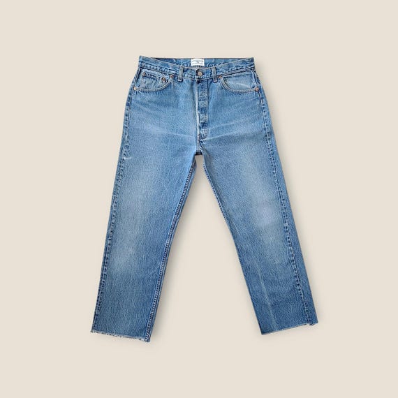 Size 32 Vintage 80s  Levi's 501 Jeans Tag size 36x34 in Medium Faded Blue With Whiskering