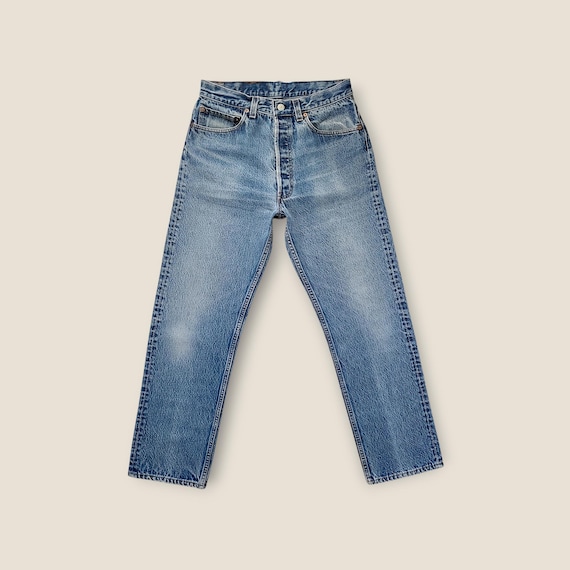 Vintage Levi's 501 Jeans Size 28 in Faded Blue with Whiskering