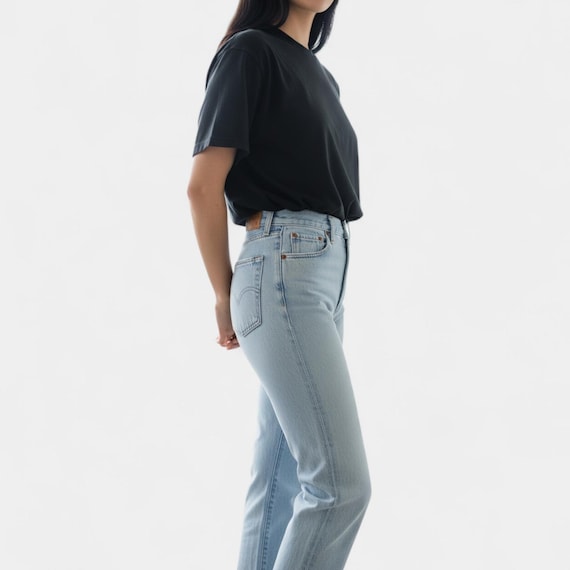 Vintage Levi's 501 Jeans Size 28 in Faded Light Wash Blue