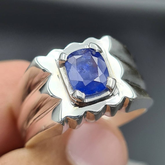 Dark Blue Sapphire and Diamond Three Stone Ring
