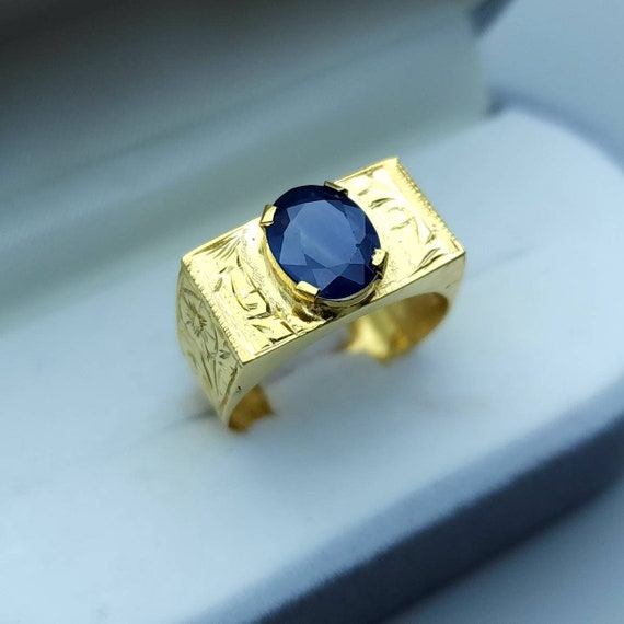 Anillo de oro con zafiro para hombre hotsell
