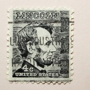 1965 Abraham Lincoln usps stamp black and white very good condition vibrant colors postmarked authentic