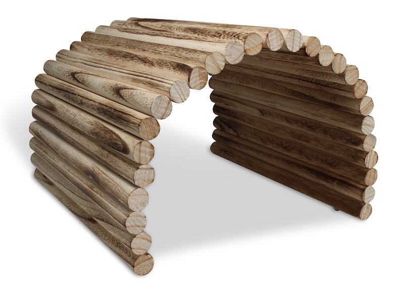 May include: A wooden tunnel made of stacked logs, perfect for small animals to play in. The tunnel is made of natural wood and has a rustic look.