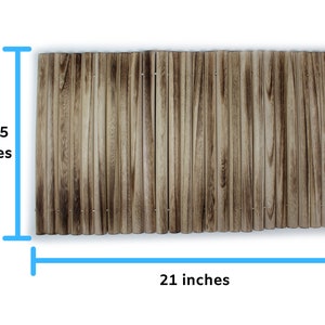 May include: A brown wooden slatted mat measuring 21 inches by 11.75 inches.