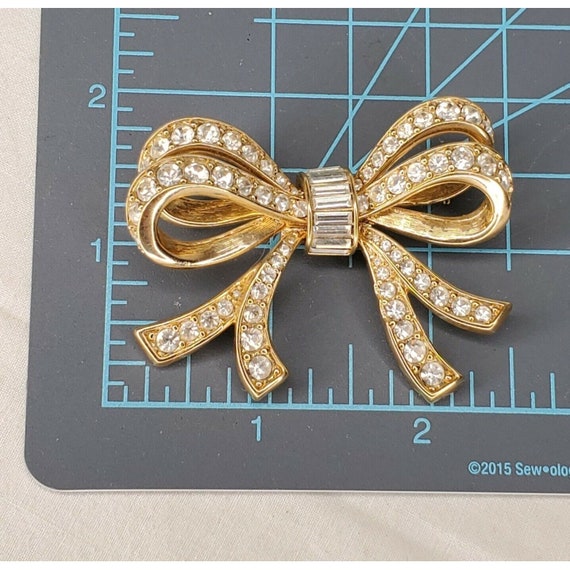 Daniel Swarovski DS Co Bow Brooch Gold Tone Crystal Baguettes Statement Signed View 4