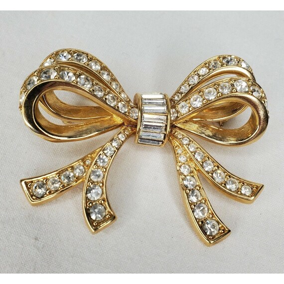 Daniel Swarovski DS Co Bow Brooch Gold Tone Crystal Baguettes Statement Signed
