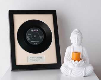 The Number 1 vinyl record on the day you were born. Unique and personalised birthday gift.