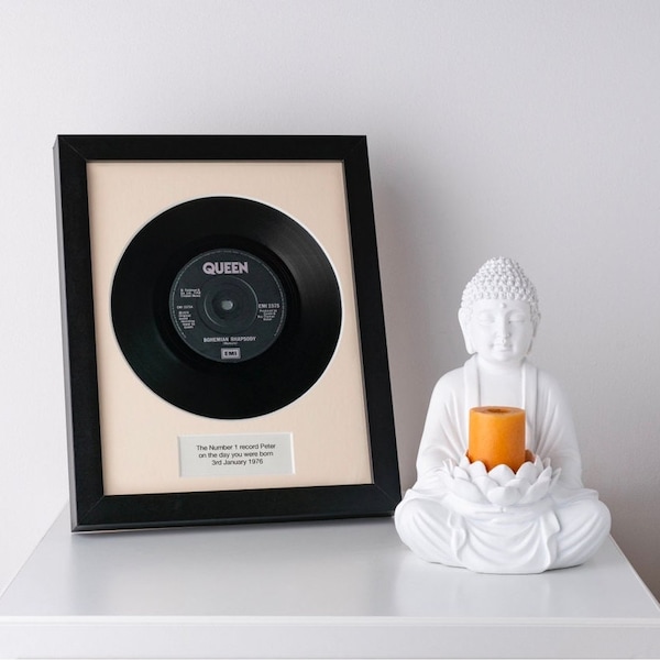 The Number 1 vinyl record on the day you were born. Unique and personalised birthday gift.