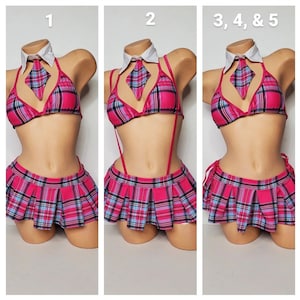 May include: A pink and blue plaid schoolgirl costume with a white collar and tie. The costume includes a bra top, skirt, and suspenders. The numbers 1, 2, 3, 4, and 5 are written on the image.