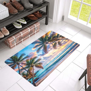 May include: A tropical beach scene with palm trees and ocean waves. The rug is a light blue color with a sunset sky and white sand beach.