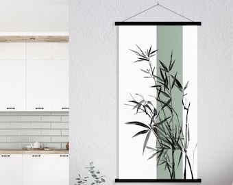 May include: A black and white wall hanging with a green background featuring a stylized illustration of bamboo plants. The hanging is displayed in a modern living room with a couch and coffee table.