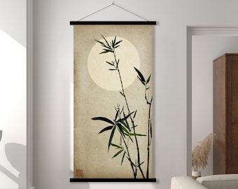May include: A black framed wall tapestry with a beige background and a stylized illustration of bamboo plants with a large white circle in the background.