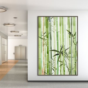 May include: A watercolor painting of a bamboo forest with green and brown hues. The painting is framed in a dark brown frame and is hanging on a white wall.
