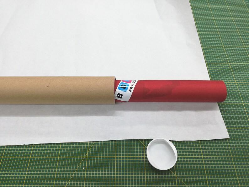 All physical prints are wrapped with tissue paper . The wrapped print is sent inside a rigid cardboard tube closed with plastic plugs, wrapped in brown paper, waterproofed with tape paper.
