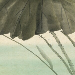 May include: Watercolor painting of a lotus plant with a large, dark green leaf and several stems. The background is a soft, pale green and cream color, creating a serene and natural aesthetic.
