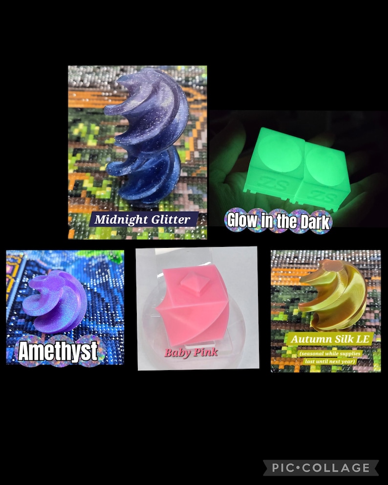 May include: A collection of five small, three-dimensional objects in various shapes and colours. Included are a dark blue glitter spiral, a glowing green cube, a purple spiral, a solid baby pink cube, and a metallic gold spiral.