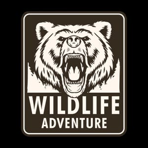 May include: A rectangular sign with a dark brown background and a white border featuring a detailed illustration of a roaring bear head with an open mouth and visible teeth. Below the bear, the text WILDLIFE ADVENTURE is printed in white.