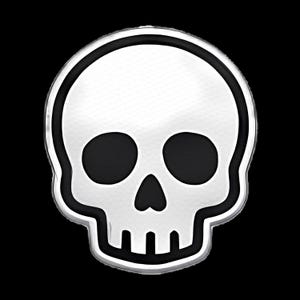 May include: A stylized skull emblem featuring a white, textured surface with a metallic sheen. The design includes deep black, hollow eye sockets, a triangular nasal cavity, and a row of rectangular teeth, all outlined by a thick black border.