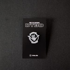 DTBD Enamel Pin