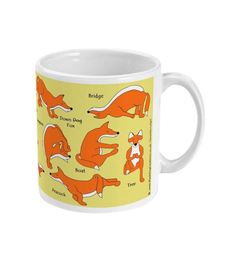 May include: A white ceramic mug with a yellow background featuring illustrations of foxes in various yoga poses. The poses are labeled with the names: Bridge, Down Dog Fox, Boat, Tree, and Peacock.