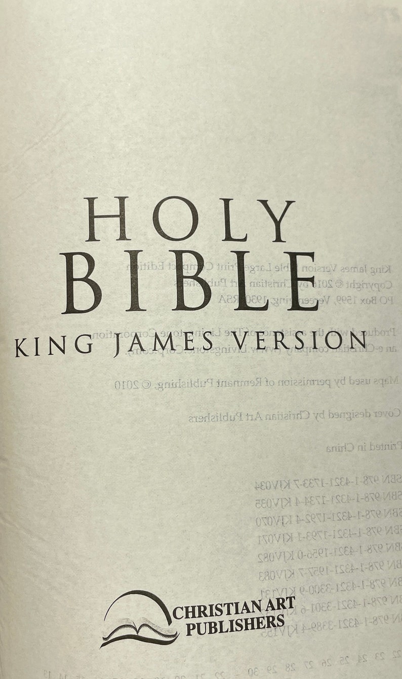 May include: A close-up of the cover of a Holy Bible, King James Version, published by Christian Art Publishers. The cover is designed by Christian Art Publishers and printed in China.