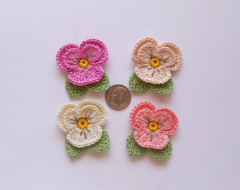 4 hand crochet pansy flowers with leaves, small pastel colored violet embellishment, home decor, scrapbooking, 1.5 inch /3.7 cm diameter