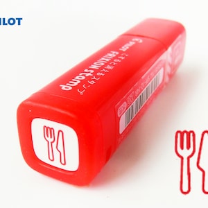 May include: Red Pilot Friction Stamp with a white fork and knife icon. The stamp is labeled "PILOT Friction Stamp" in Japanese and English.