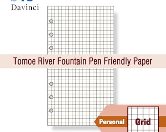 May include: A white grid paper notebook with a gray grid pattern. The notebook has several holes on the left side for binding. The text "Tomo River Fountain Pen Friendly Paper" is displayed across the center of the image.