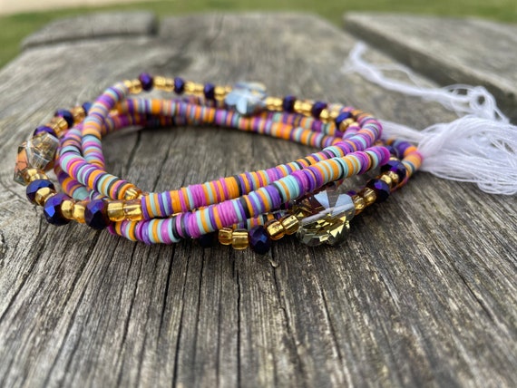 Waist bead made with 8mm African Vulcanite Vinyl heishi beads with gold seed beads