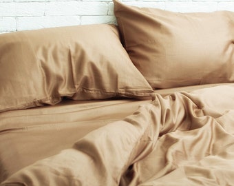 Katoensatijn lakens set van 4 stuks in beige. Bovenlaken, hoeslaken, 2 kussenslopen. 2 aparte bedden volledig queensize bed op maat
