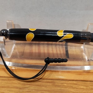stylus with keeper plug made with black and yellow acrylic