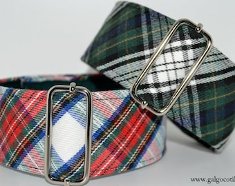 May include: Two dog collars with a plaid pattern in red, green, white, and blue. Each collar has a silver-colored rectangular buckle. The collars are designed with a classic tartan pattern.