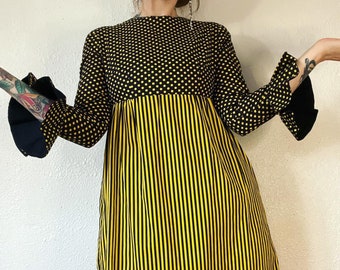 Vintage early 1960’s black & yellow polka dot and stripe mashup mega mod mini dress with trumpet sleeves