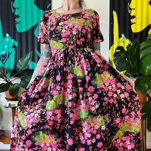 Vintage 1960’s psychedelic neon floral dress with raglan puff sleeves and the most incredible electric garden print