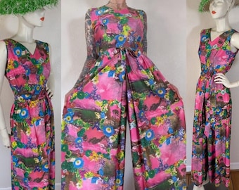Vintage jaren 1970 Alice bloemenfotoprint nauwsluitende jumpsuit in de kleuren roze, paars, blauw, groen, oranje en geel dubbele V wijde pijpen