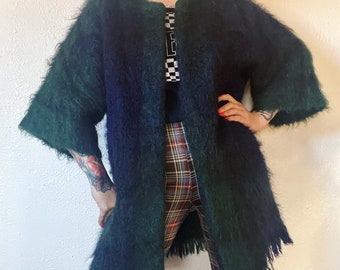 Vintage 1950’s shaggy mohair plaid sweater coat/cardigan in rich emerald greens, purples and black with open front, dolman sleeve and fringe