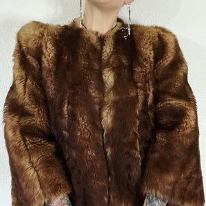 Vintage 1940’s/1950’s shades of caramel cropped paneled shearling jacket with vertical panels bound by grosgrain, front welt pockets and the image 5