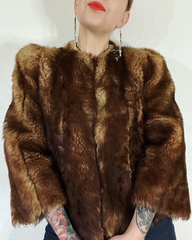 Vintage 1940’s/1950’s shades of caramel cropped paneled shearling jacket with vertical panels bound by grosgrain, front welt pockets and the image 5