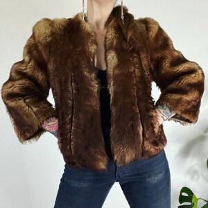 Vintage 1940’s/1950’s shades of caramel cropped paneled shearling jacket with vertical panels bound by grosgrain, front welt pockets and the image 4
