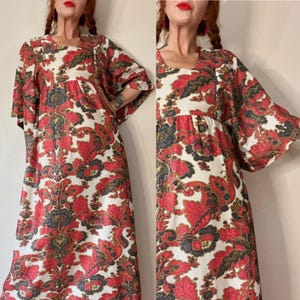 Vintage late 1960’s/early 1970’s psychedelic floral & lurex sparkle maxi dress with dolman angel sleeves and gathered empire waist