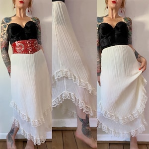 Vintage 1970’s ivory lightweight crinkle gauze double layer Victorian revival prairie skirt with curved hem & lace trim by Roberta.