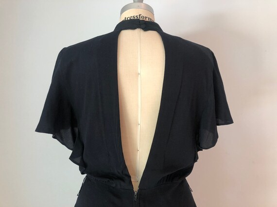 Vintage black 1980’s / 1990’s era backless peplum
