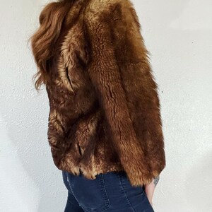 Vintage 1940’s/1950’s shades of caramel cropped paneled shearling jacket with vertical panels bound by grosgrain, front welt pockets and the image 3