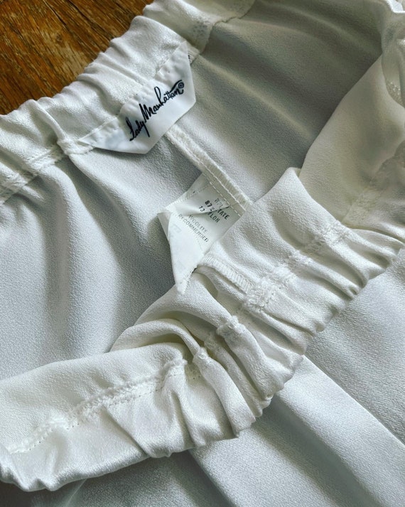 Vintage 1970’s snow white liquid satin wide leg bells… Gem