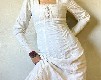 Vintage 1970’s ivory seersucker stripe corset prairie maxi with zip cuff leg of mutton sleeved, tie back waist, cotton lace trim and ruffle