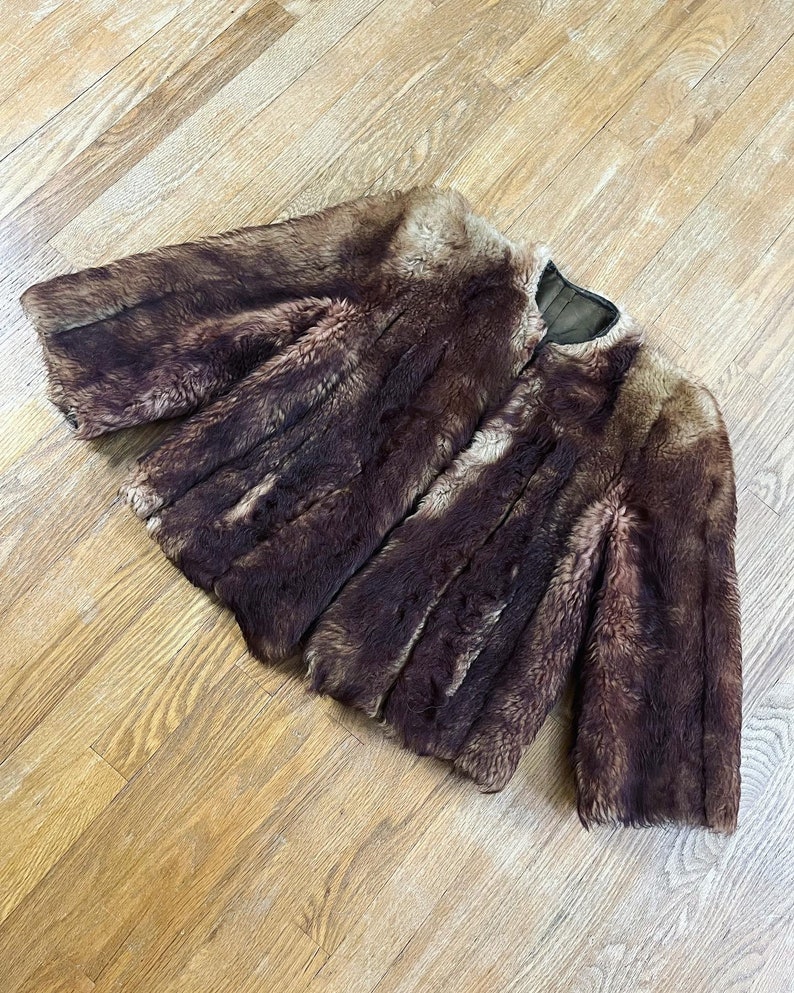 Vintage 1940’s/1950’s shades of caramel cropped paneled shearling jacket with vertical panels bound by grosgrain, front welt pockets and the image 10